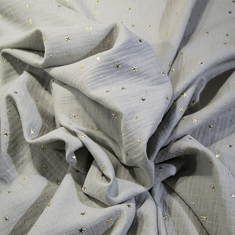 Муслін (жатка-глітер 1,35 м) золоті зірочки на світло-сірому